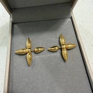 Gold Tone Cross Flower Earrings - Shiny Textured Petals